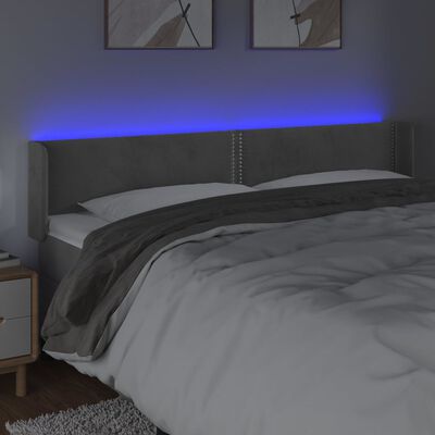 vidaXL sengegavl med LED-lys 163x16x78/88 cm fløjl lysegrå